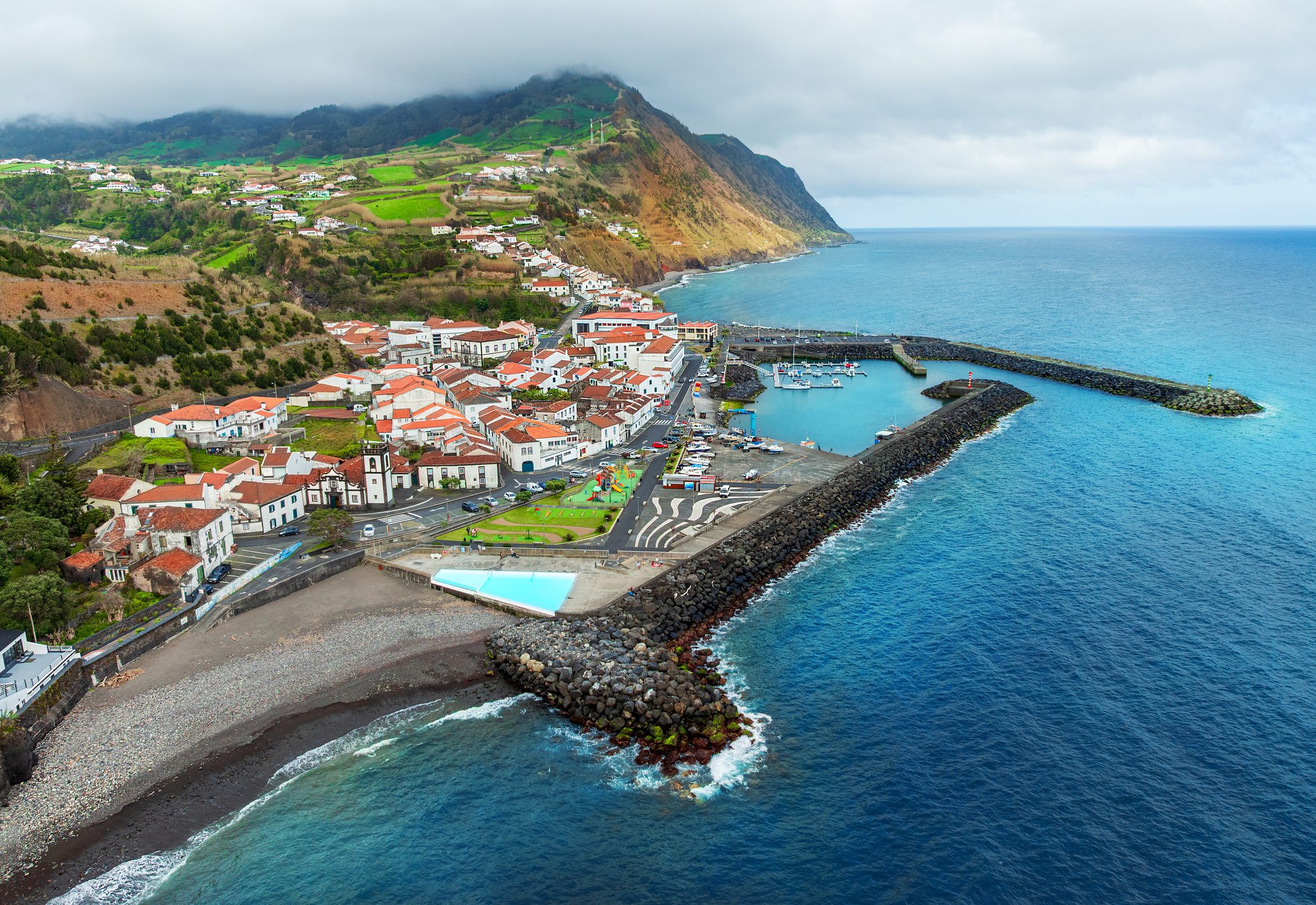 Aerial view of coastal village with harbor